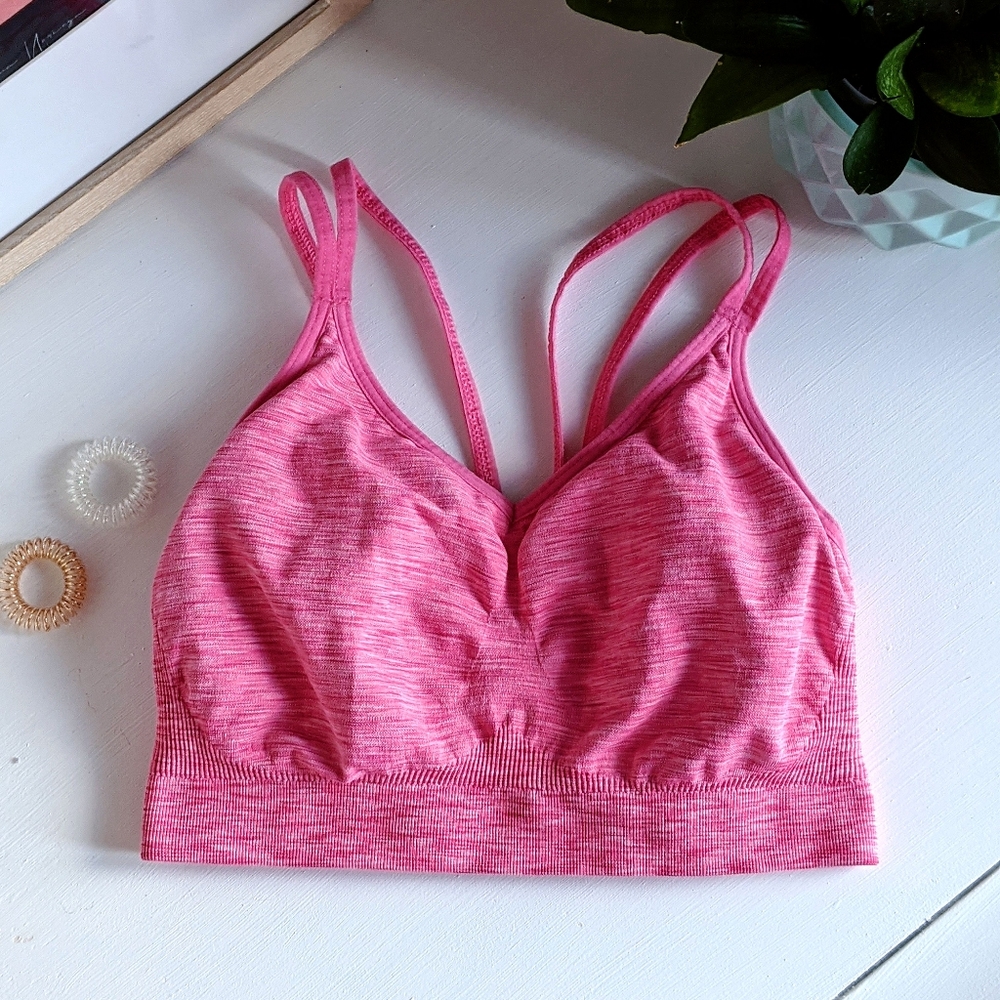pink stretchy sports bra with racer back straps, medium